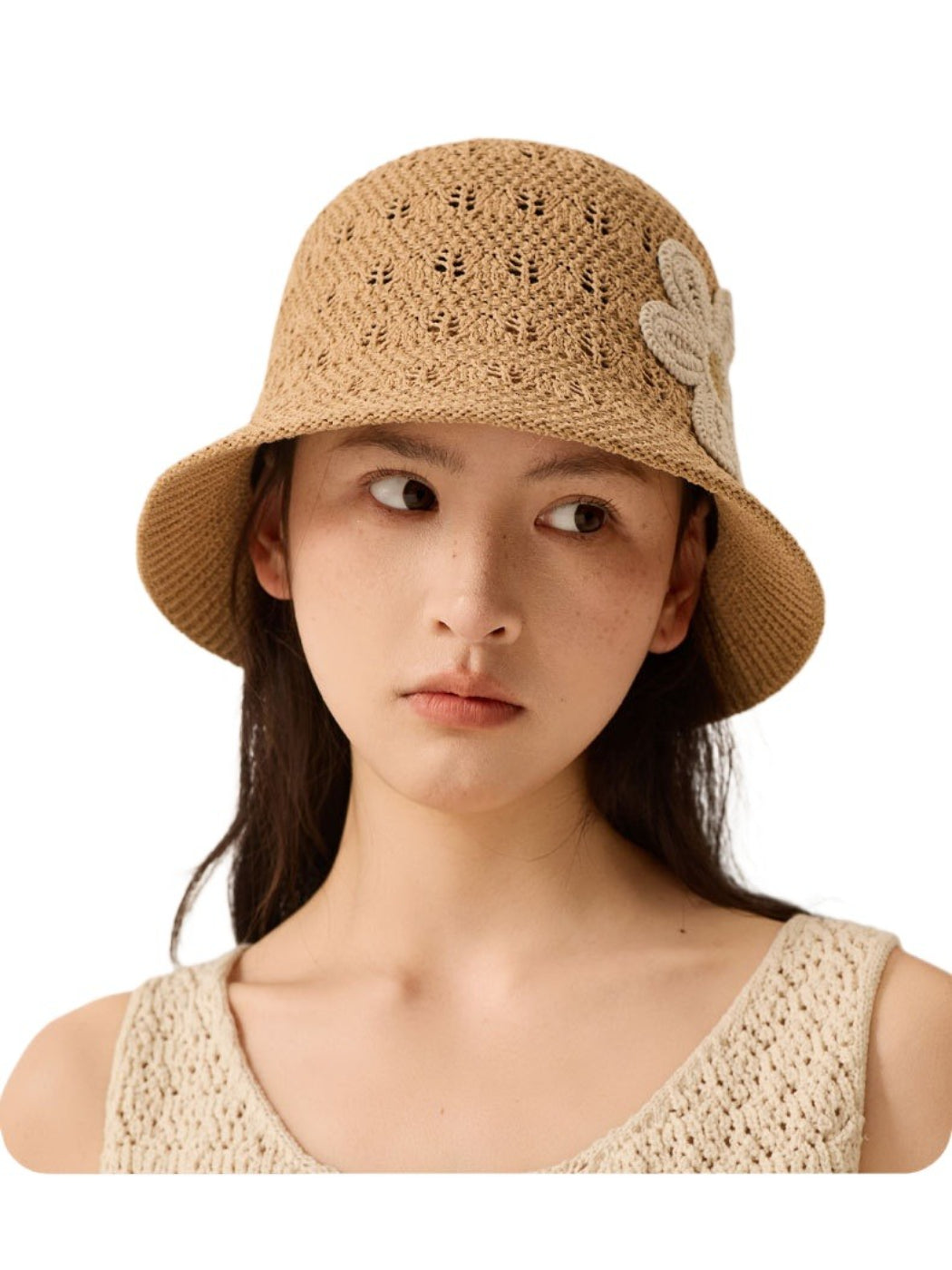 Haila open weave flower hat styled with casual summer outfit on model