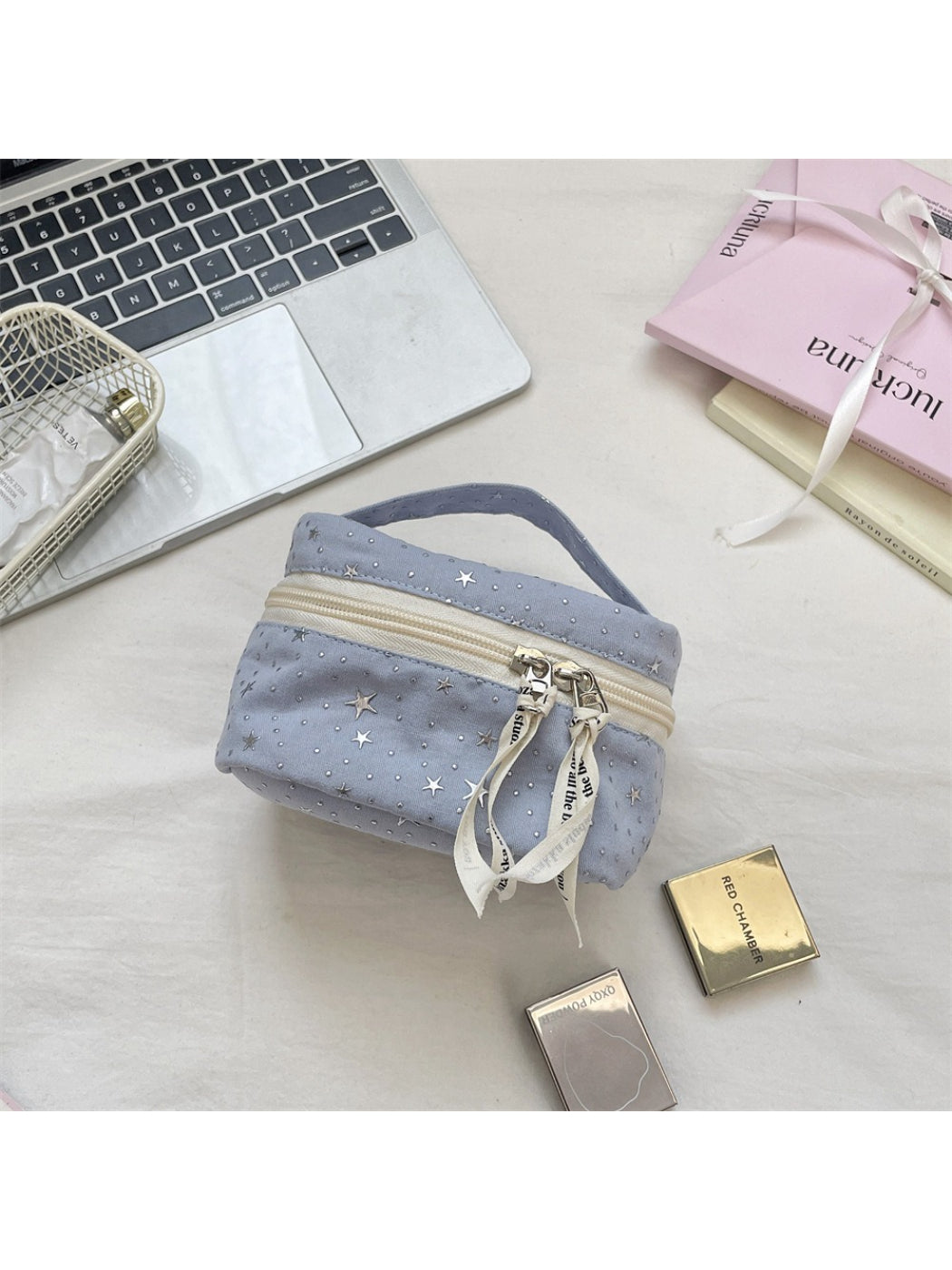 Cosbai star print makeup bag with zipper visible on top