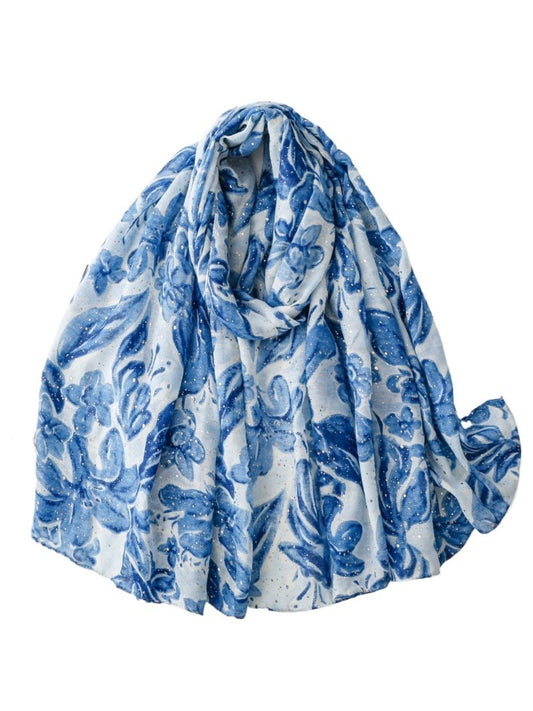 Close-up of Scarvii floral print scarf showing detailed flower patterns and fabric texture