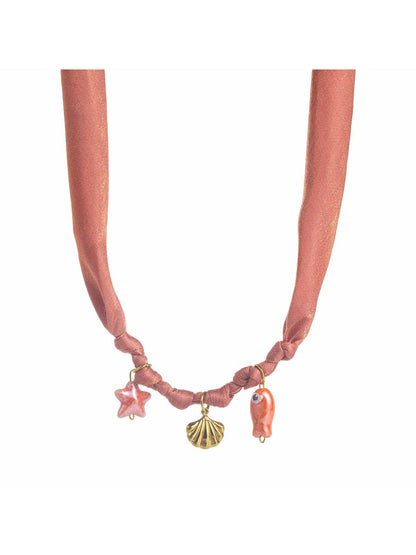 Model wearing Neckit Summer Charm fabric necklace with casual summer dress