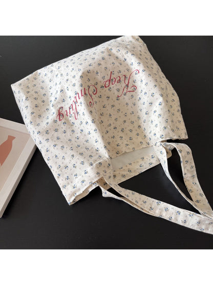 Cosbai vintage floral tote bag displayed flat showing full floral and lettering design