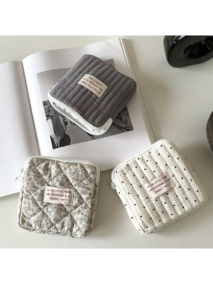 Cosbai mini storage pouch showing front side with vibrant cartoon illustrations