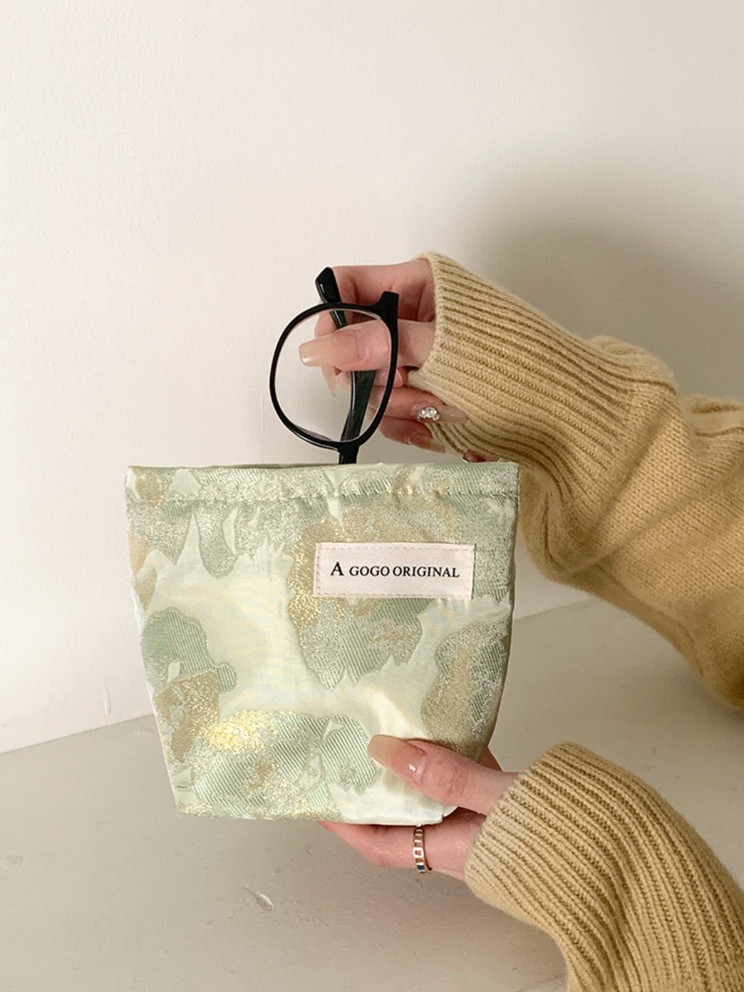 Cosbai blush floral cosmetic bag displayed standing upright with visible floral design