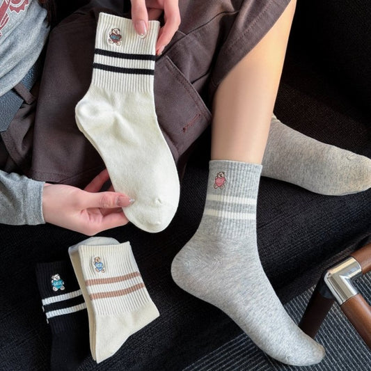 Rufia Mini Motif Stripe Crew Socks folded showing striped pattern and mini motifs