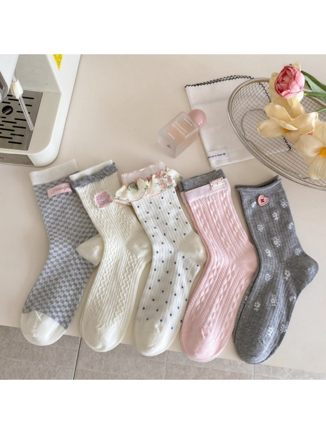 Close-up of Rufia crew socks showing ribbed cuff and delicate knit texture