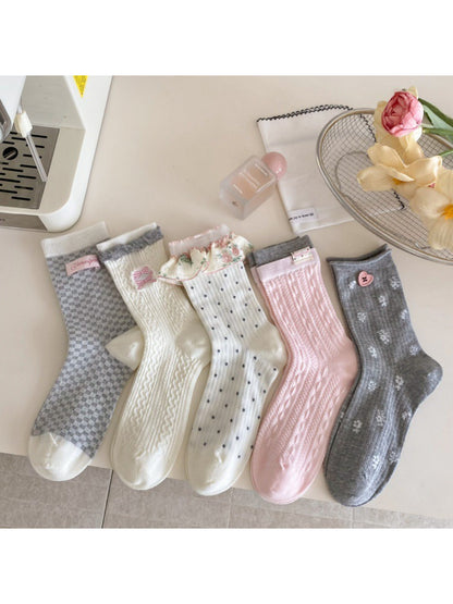 Close-up of Rufia crew socks showing ribbed cuff and delicate knit texture