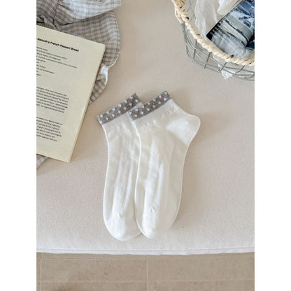Rufia Sweet Ribbon Accent ankle socks paired with denim shorts on model