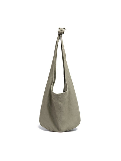Cosbai striped slouchy crossbody bag with strap extended