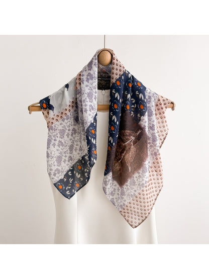 Scarvii Botanical Illustration Square Scarf folded neatly with visible floral artwork