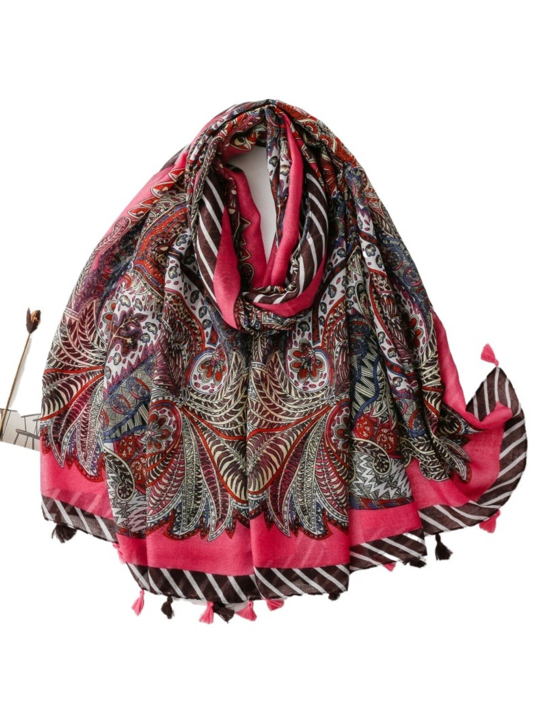 Model wearing boho paisley tassel wrap scarf styled around neck
