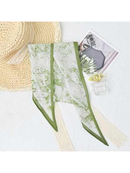 Scarvii abstract print triangle scarf folded with visible fabric texture