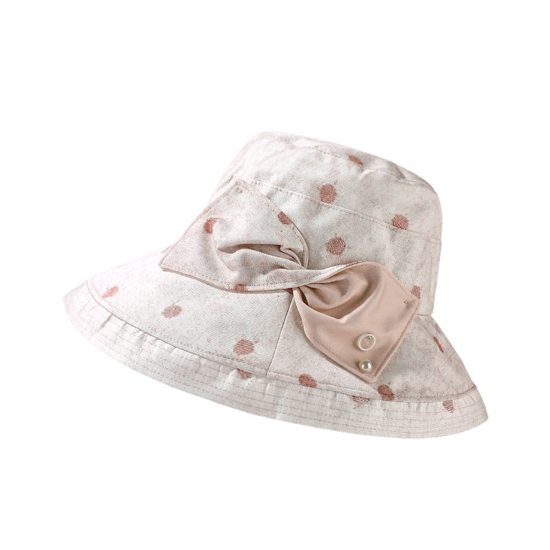 Model wearing Haila hat paired with casual summer outfit