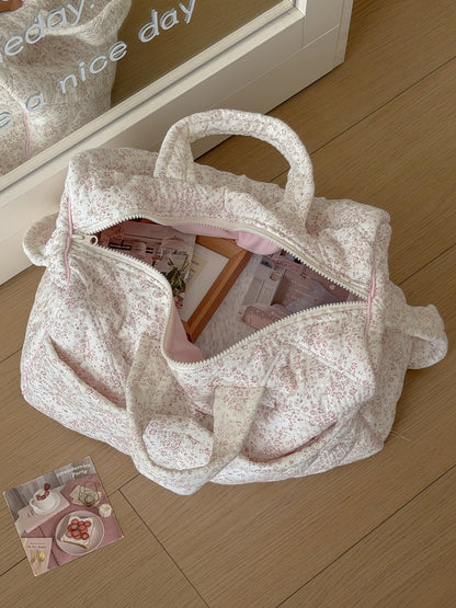 Top view of Cosbai floral travel bag highlighting padded design