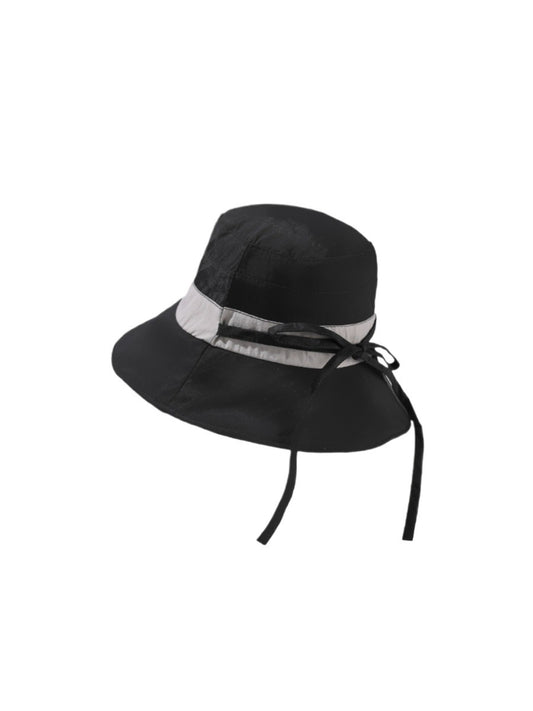 Side view of Haila ribbon band bucket hat showing the textured fabric