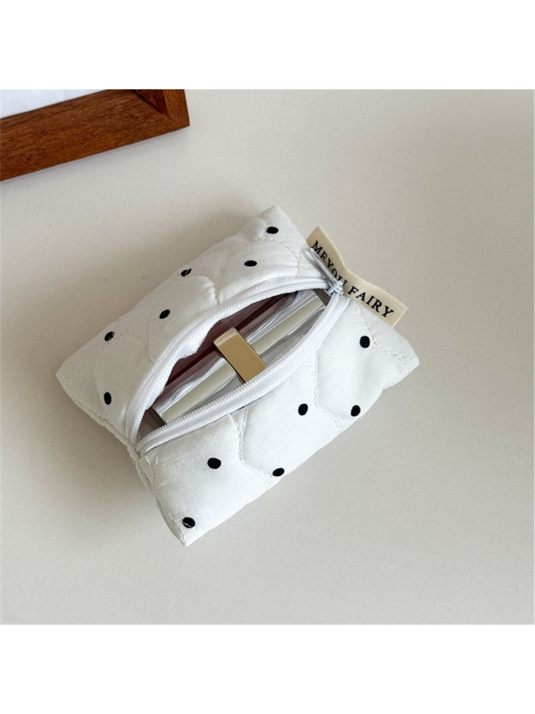 Cosbai Quilted Dot Cosmetic Bag with focus on the stitching and quilted dots