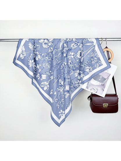 Scarvii square scarf styled as a headscarf with floral print