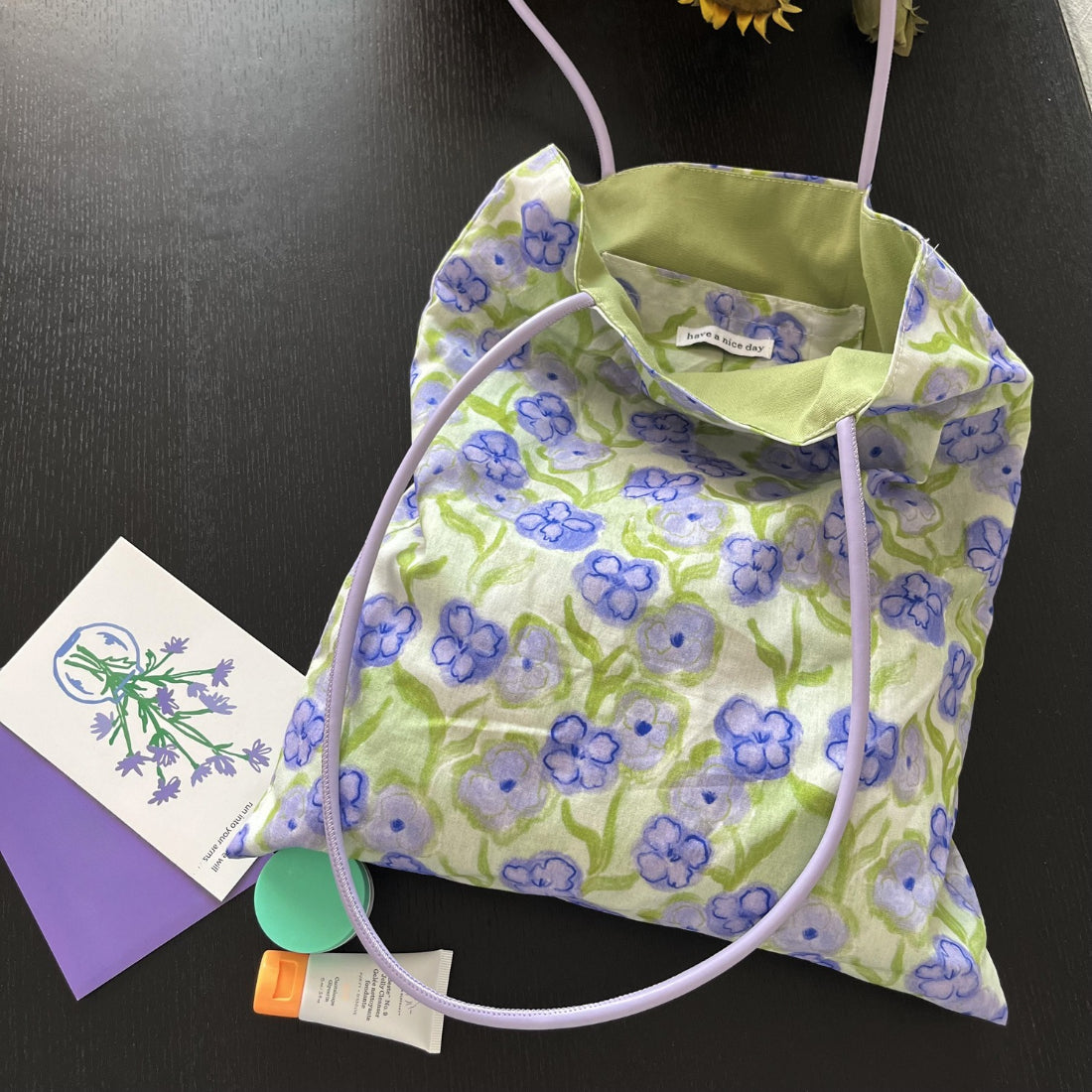 Interior view of Cosbai purple bucket bag showing spacious compartment