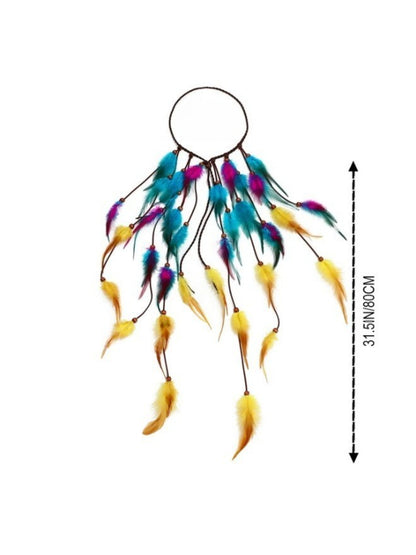 Hairish boho feather headpiece displayed on a plain background highlighting feather details