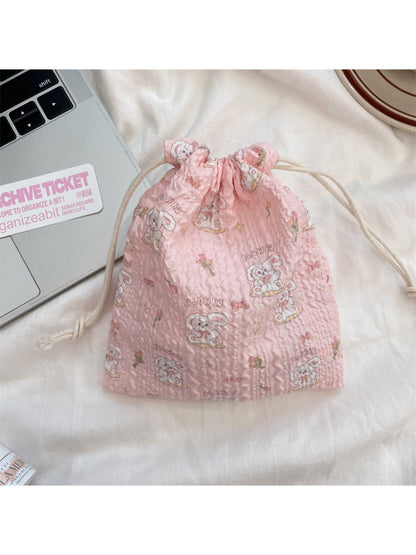 Cosbai cartoon drawstring pouch with vibrant cartoon print on fabric surface