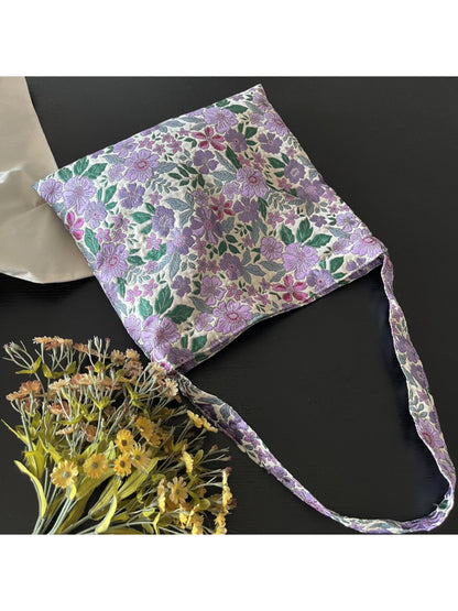Cosbai Purple Bloom Slouch Shoulder Bag worn on shoulder by model