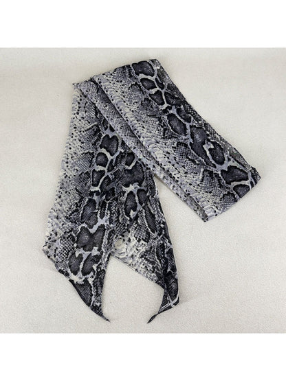 Monochrome snake print scarf laid flat highlighting texture and pattern