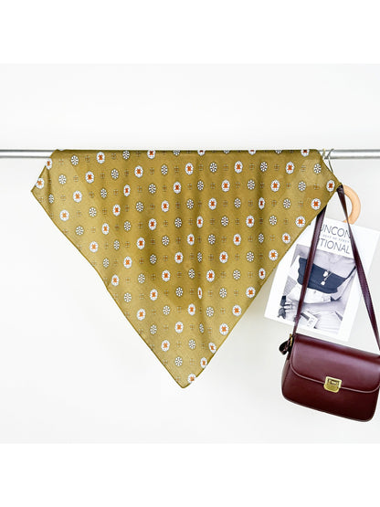 Scarvii Mini Motif Bandana Square Scarf tied around wrist as a fashion accessory