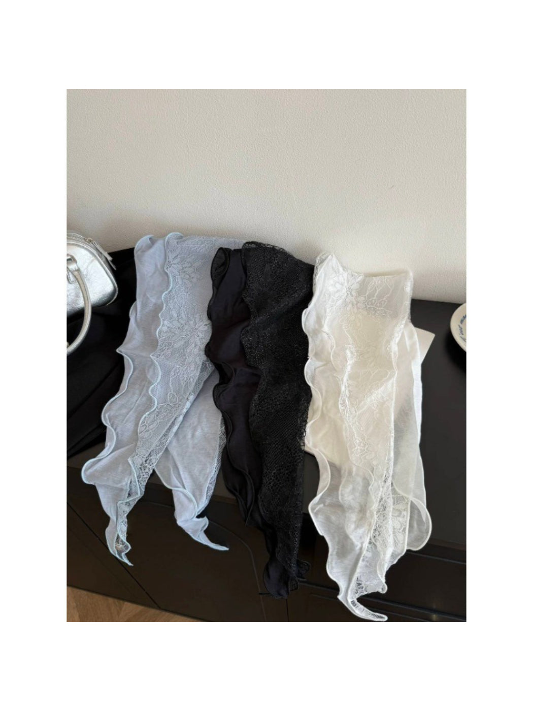 Lightweight headscarf with delicate lace edges in soft pastel color