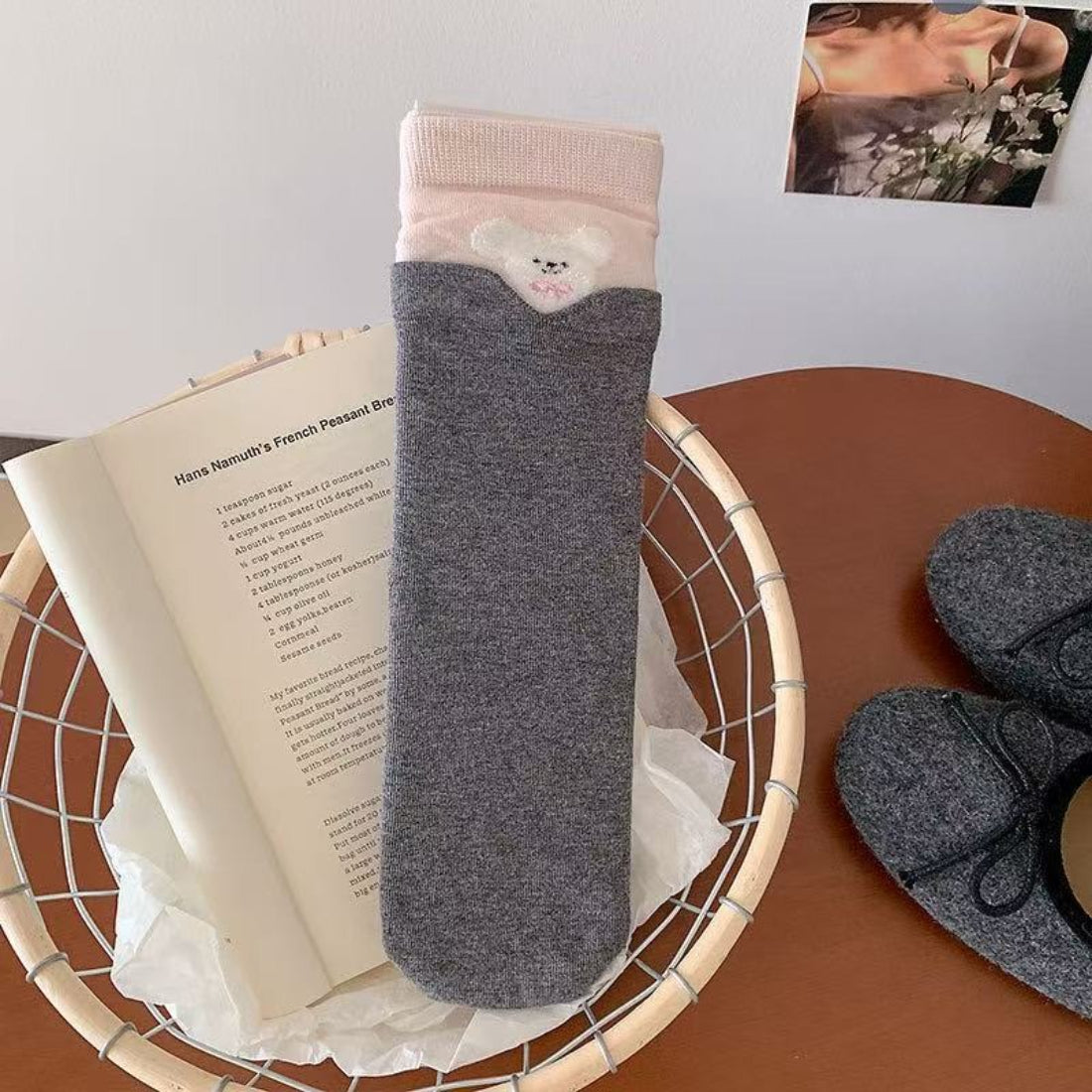 Side view of Rufia foldover socks featuring fox face and orange accents