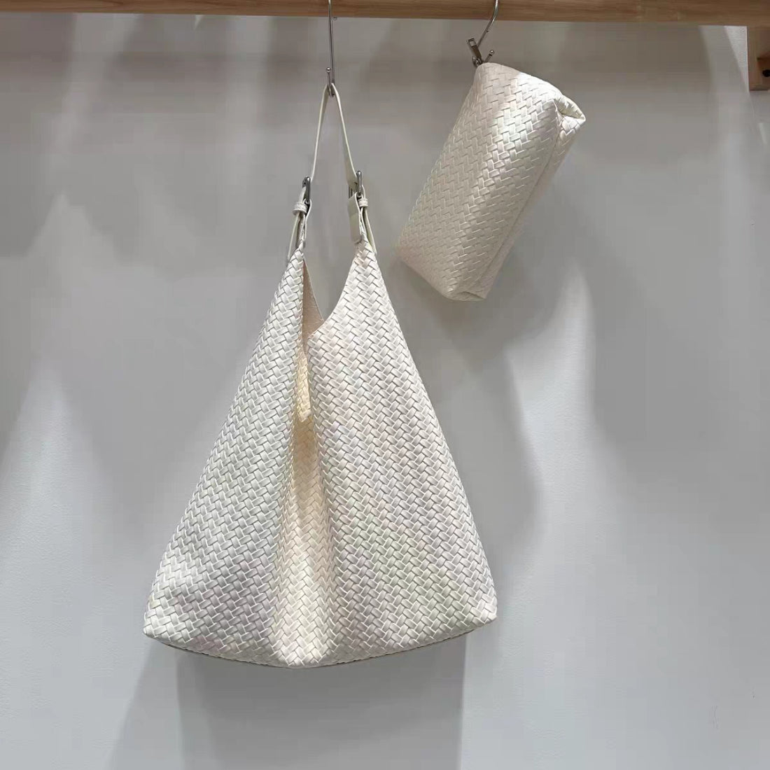 Side view of Cosbai woven slouchy hobo bag showing texture and shape