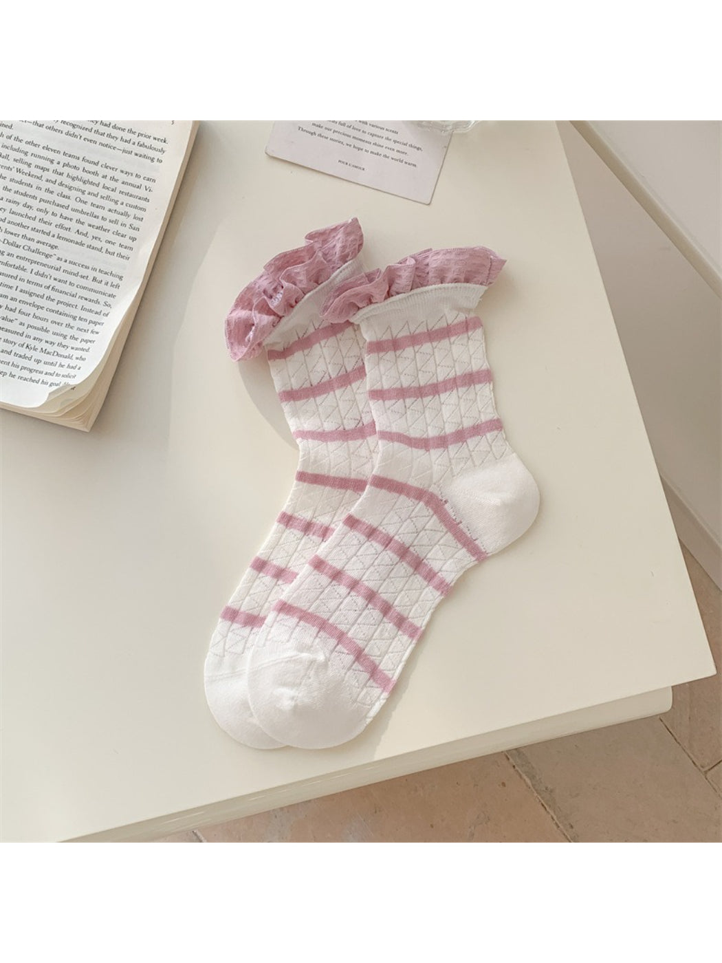 Side view of Rufia summer crew sock showing ribbed texture and frill cuff design
