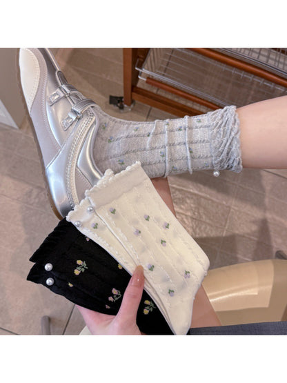 Rufia floral crew socks with bead detailing on white background