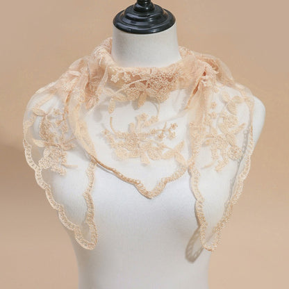 Haila lace veil head scarf styled as a head covering on model outdoors