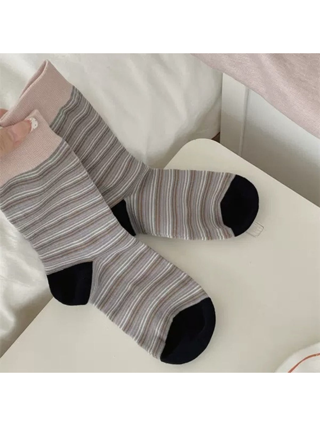 Stack of Rufia Fine Stripe Everyday Crew Socks in various color options