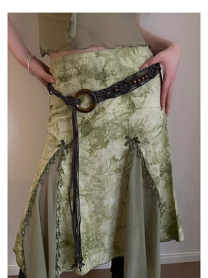 Flat lay of Beco Boho braided rope waist belt coiled with visible texture and natural color