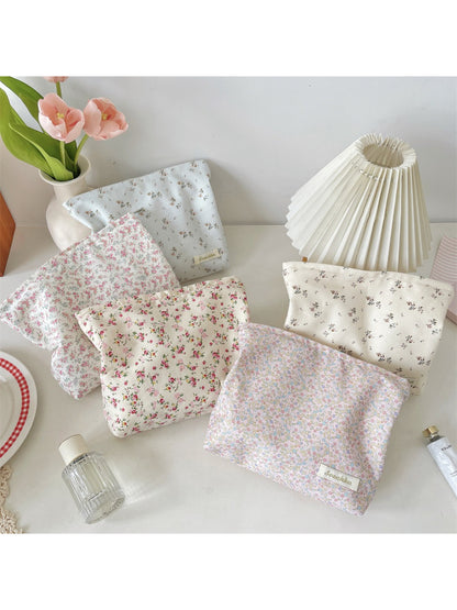 Close-up of Cosbai cosmetic pouch and floral fabric pattern