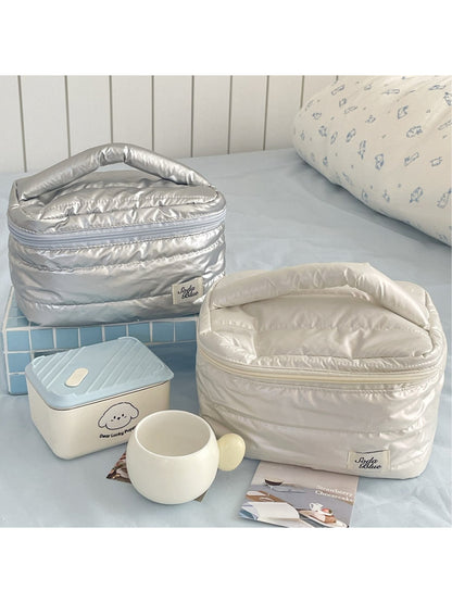 Top view of Cosbai quilted makeup bag showing spacious interior
