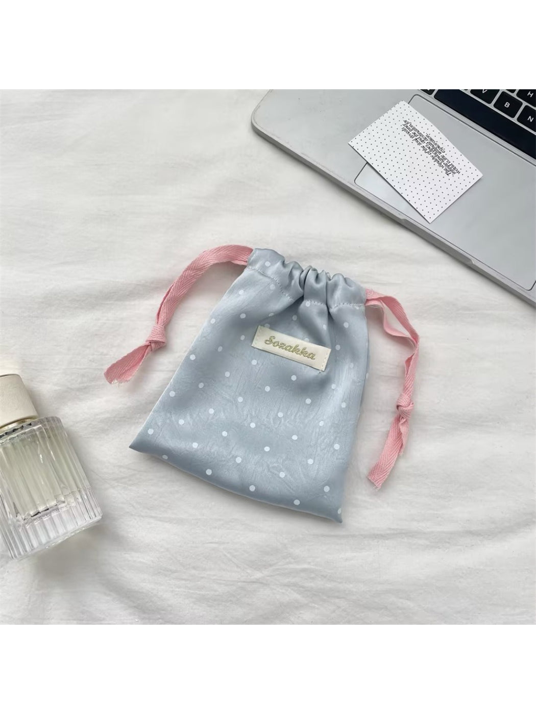 Cosbai Sweet Dot Drawstring Bag worn over shoulder by model