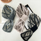 Scarvii - Two-Tone Knitted Scarf with Slip-Through Design