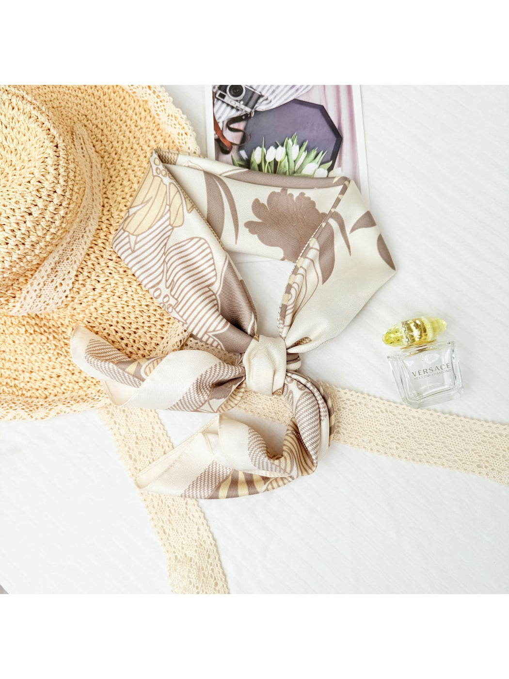 Scarf folded to display colorful flower graphics and clean edges