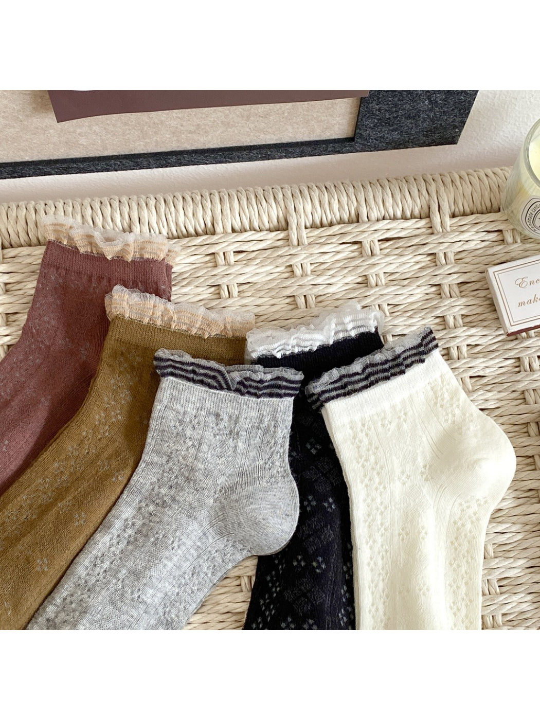 Folded Rufia fine pointelle everyday socks showing soft fabric and knit design