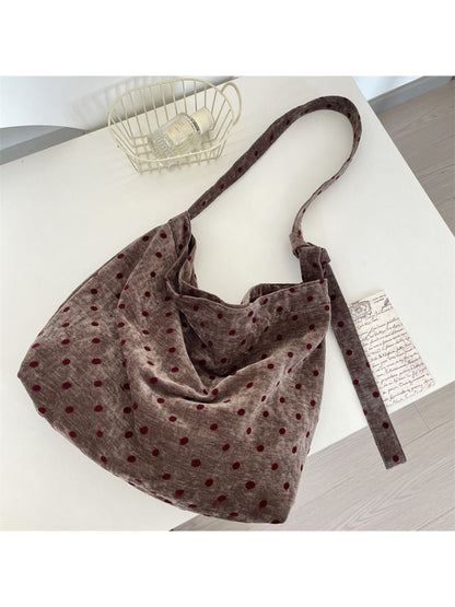 Top view of Cosbai Polka Dot Crossbody Slouchy Bag highlighting slouchy design