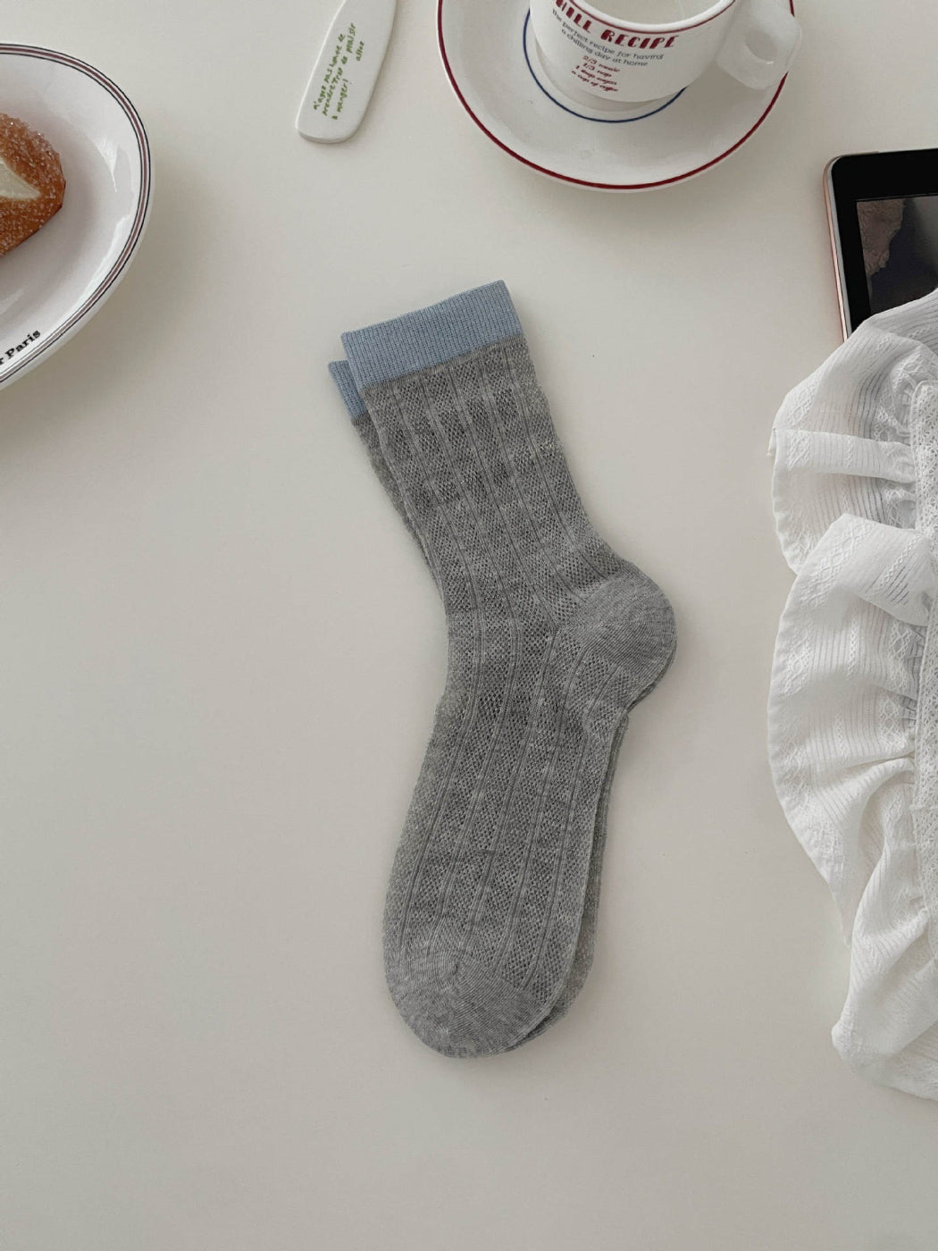 Rufia socks folded to show ribbed fabric and color contrast details