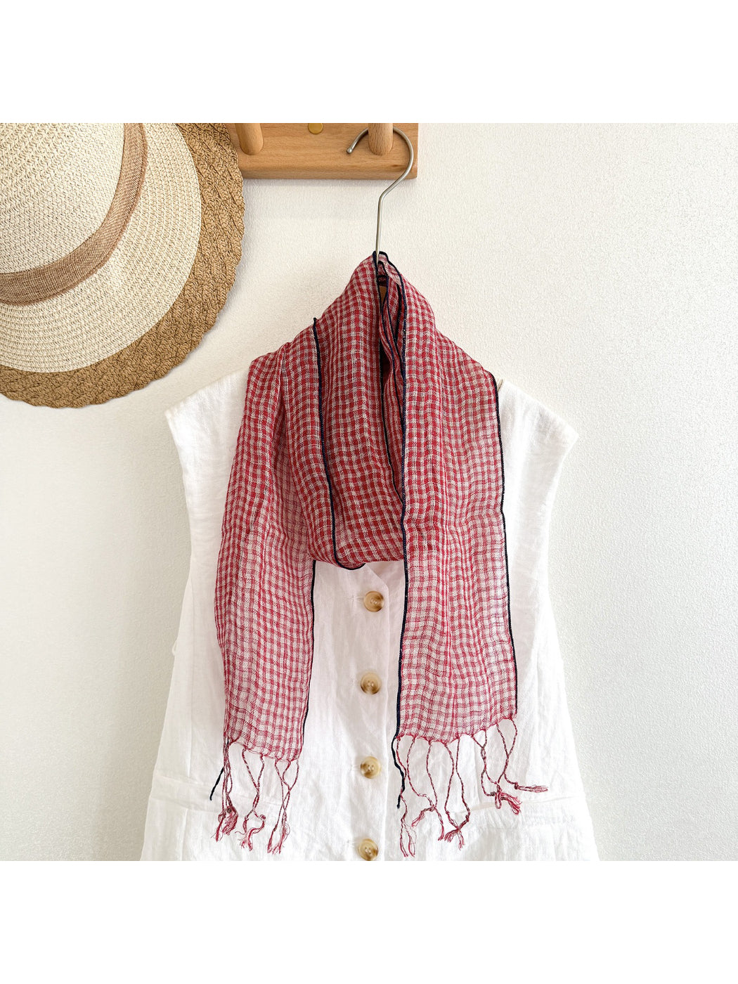 Model wearing Scarvii classic stripe trim skinny scarf with casual outfit