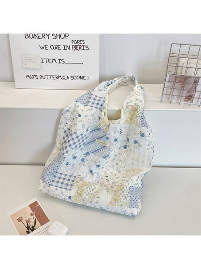 Cosbai tote bag open to display spacious interior with light-colored lining