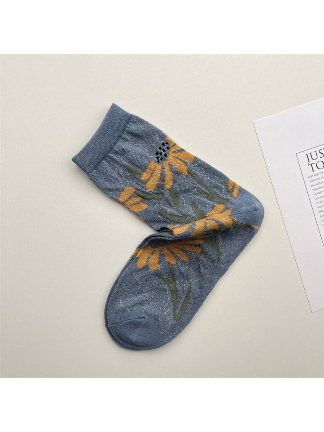 Rufia floral blue crew socks with botanical pattern