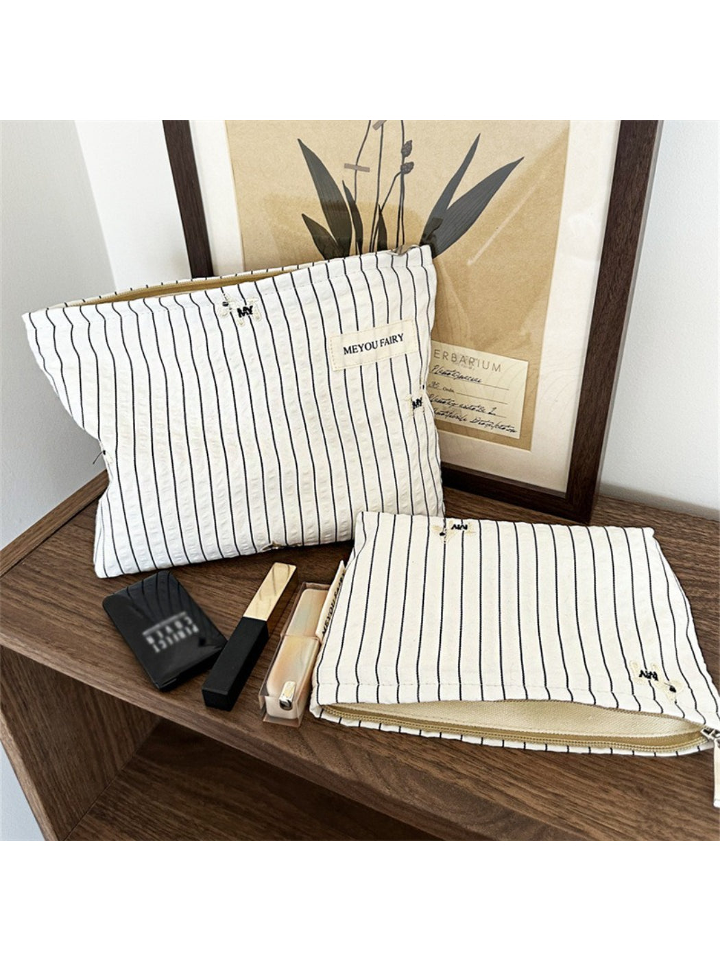 Cosbai Classic Pinstripe Cosmetic Organizer closed with black and white pinstripe design