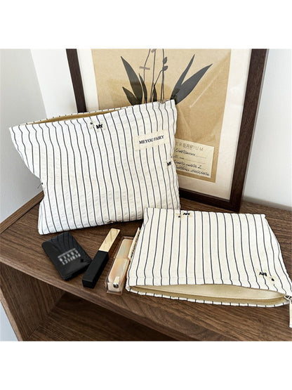 Cosbai Classic Pinstripe Cosmetic Organizer closed with black and white pinstripe design