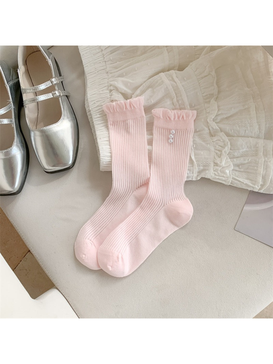 Rufia soft rib crew socks folded to show delicate trim and ribbing