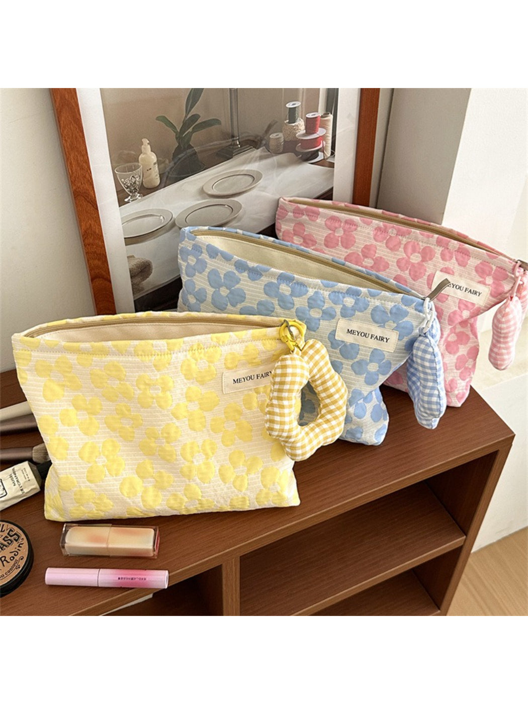 Cosbai floral cosmetic pouch open, showing spacious interior for makeup storage