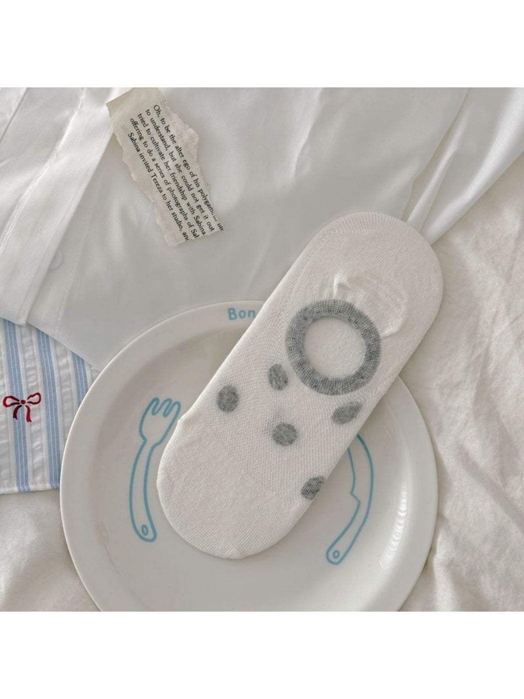 Multiple pairs of Rufia invisible socks with various puppy designs arranged in a row